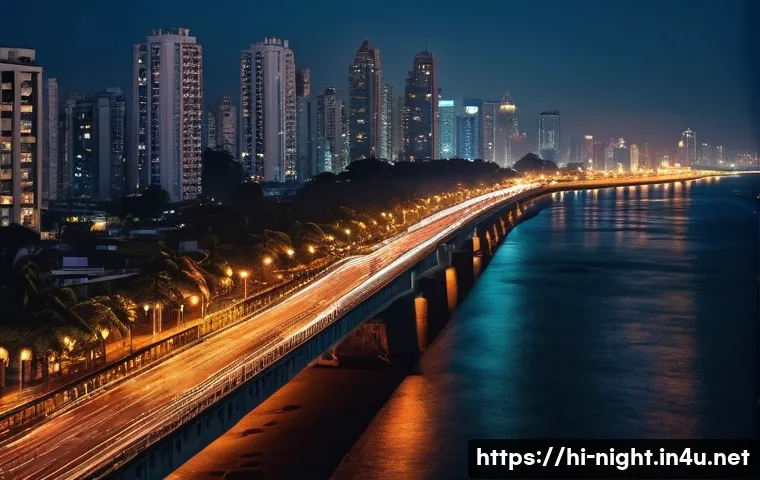 야경을 활용한 여행지 홍보 - A vibrant night scene of Marine Drive in Mumbai, showcasing the glittering city lights reflecting on...